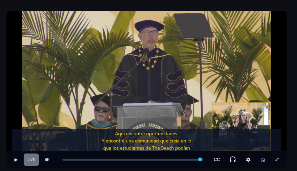Accessible commencement livestream featuring Spanish subtitles, an American Sign Language interpreter, and streaming player controls for captions, audio, and accessibility options.