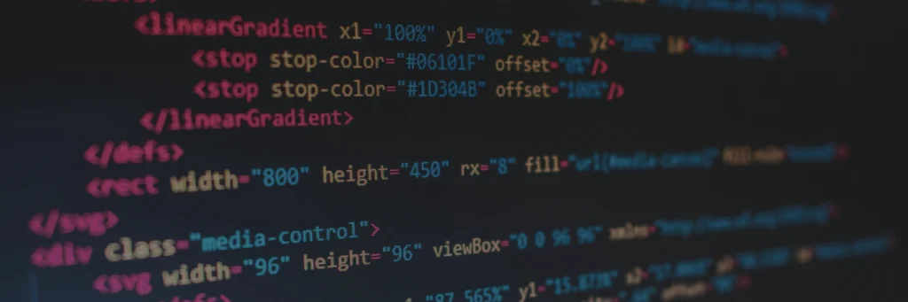 Highlighted HTML and SVG code on a dark screen showing media player design elements